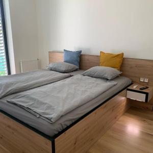 Tempat tidur dalam kamar di Ubytování v Beskydech - Apartmán Pavel