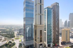 an aerial view of a city with tall buildings at Silkhaus Modern 1BDR in DIFC near Metro Station in Dubai