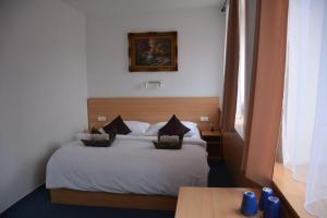 Voodi või voodid majutusasutuse Hotel O.K. 1 toas