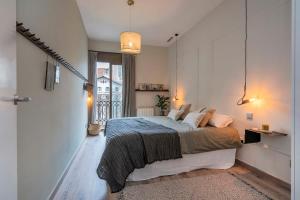 Postel nebo postele na pokoji v ubytování Luxury 4-bedrooms in Rambla de Catalunya