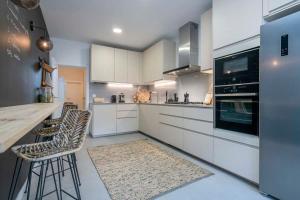 Kuchyň nebo kuchyňský kout v ubytování Luxury 4-bedrooms in Rambla de Catalunya