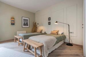 Voodi või voodid majutusasutuse Luxury 4-bedrooms in Rambla de Catalunya toas