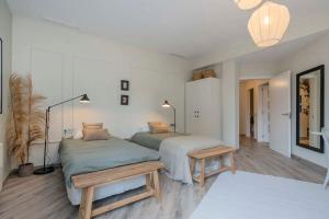 Postel nebo postele na pokoji v ubytování Luxury 4-bedrooms in Rambla de Catalunya