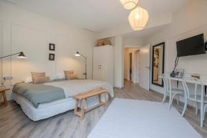 Postel nebo postele na pokoji v ubytování Luxury 4-bedrooms in Rambla de Catalunya