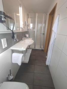 Koupelna v ubytování Hotel Grüner Baum