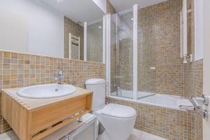 Kúpeľňa v ubytovaní Cozy and bright 3BD apartment by Gran Via