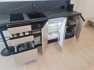 Η κουζίνα ή μικρή κουζίνα στο Nel Sole Business