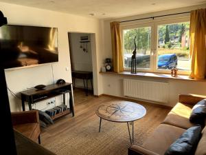 Posezení v ubytování Freistehendes Haus im Nationalpark Gemünd mit E-bike Option!