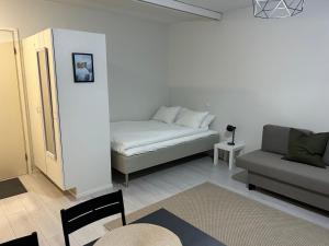 Ένα ή περισσότερα κρεβάτια σε δωμάτιο στο Haven Homes, Winter Haven