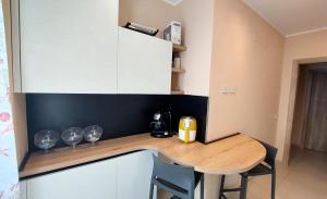Kuchyň nebo kuchyňský kout v ubytování Nanà Holiday House
