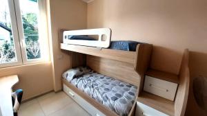 Postel nebo postele na pokoji v ubytování Nanà Holiday House