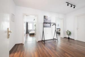 TV a/nebo společenská místnost v ubytování Living in Munich City Center