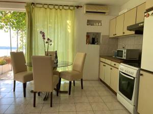 Kuchyňa alebo kuchynka v ubytovaní Apartments Jaca