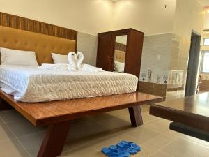 Postel nebo postele na pokoji v ubytování Homestay Á Âu Family