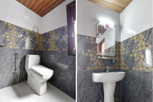 Et badeværelse på FabHotel Mayra Grand