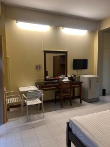 TV a/nebo společenská místnost v ubytování Lalisa Hotel Aonang