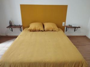 Postel nebo postele na pokoji v ubytování Appartement en plein centre.