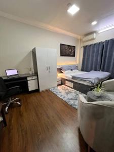 Letto o letti in una camera di GSquare Serviced Appartment