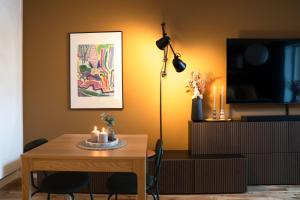 TV a/nebo společenská místnost v ubytování Guestly Homes - Elite Studio
