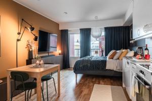 Kuchyň nebo kuchyňský kout v ubytování Guestly Homes - Elite Studio