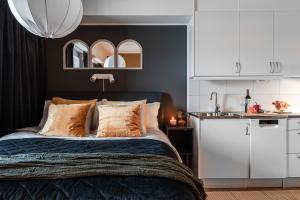 Kuchyň nebo kuchyňský kout v ubytování Guestly Homes - Elite Studio