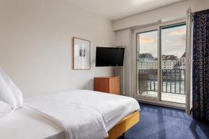Merian am Rhein客房内的一张或多张床位