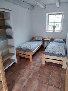 Postel nebo postele na pokoji v ubytování Ubytování U studny