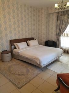 Postel nebo postele na pokoji v ubytování Elan Rimal Suites