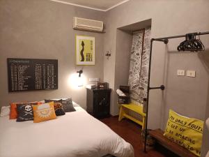 A bed or beds in a room at The Place