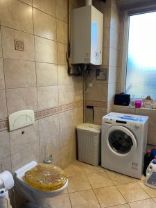 Koupelna v ubytování Apartament Muszelka