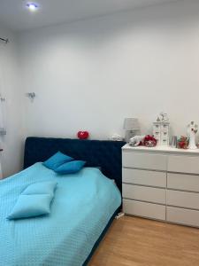 Postel nebo postele na pokoji v ubytování Apartament Muszelka
