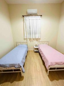 A bed or beds in a room at Messenian Style House with Great Views