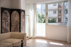 Posezení v ubytování Shanghai Downtown Yi Du B&B - Near Hongqiao Station and Jiaotong University