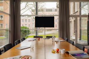 TV a/nebo společenská místnost v ubytování The Manor Amsterdam