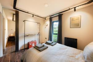 מיטה או מיטות בחדר ב-Luxury Container Lodge