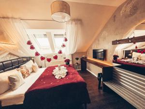 Posteľ alebo postele v izbe v ubytovaní Alfons Boutique Hotel