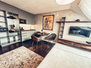 Kuchyňa alebo kuchynka v ubytovaní Alfons Boutique Hotel