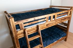 Bunk bed o mga bunk bed sa kuwarto sa Ittokashivacationrental nuevoL7 - Vacation STAY 83674v