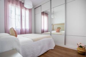 Posteľ alebo postele v izbe v ubytovaní Apartamento Leyendas de Becquer A4