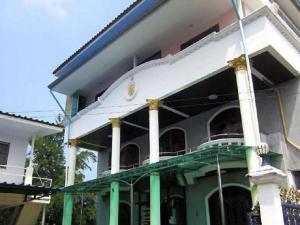 a house being built with scaffolding on it at AA Guesthouse in Pattaya South