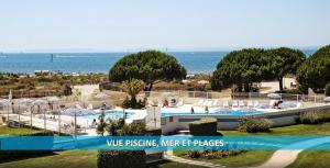 Πισίνα στο ή κοντά στο CAMARG'Beach Vue mer-Piscines-Plages-Tennis-Parking-4PERS