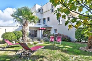 Κήπος έξω από το LocaLise - A80 - La villa blanche - Côté jardin - Plain-pied - Wifi inclus - Draps inclus - Animaux bienvenue