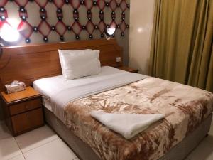 Postel nebo postele na pokoji v ubytování Index Hotel