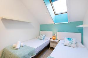 Postel nebo postele na pokoji v ubytování BIO FUENGIROLA PENTHOUSE, south Terrace