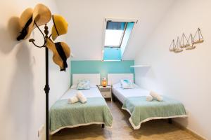 Postel nebo postele na pokoji v ubytování BIO FUENGIROLA PENTHOUSE, south Terrace