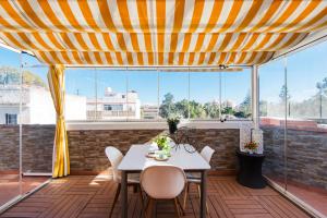 Balkón nebo terasa v ubytování BIO FUENGIROLA PENTHOUSE, south Terrace