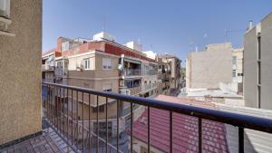 a view of a city from a balcony at Piso en Carolinas con 3 dormitorios in Alicante