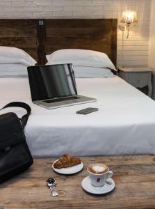 Postel nebo postele na pokoji v ubytování Best Western Maison B Hotel