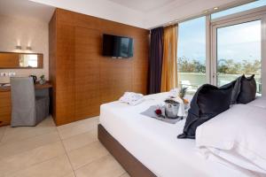 Postel nebo postele na pokoji v ubytování Best Western Maison B Hotel