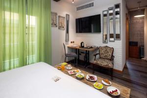 TV a/nebo společenská místnost v ubytování Best Western Maison B Hotel